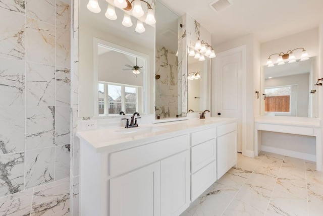 bathroom featuring a walk in shower, marble finish floor, a sink, and visible vents