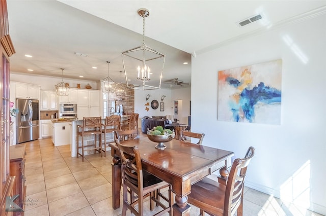 357 County Road 337, Tuscola, TX 79562 - dining room with crown molding, light tile patterned floors, visible vents, and recessed lighting