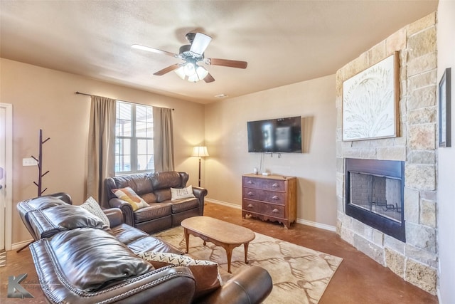 357 County Road 337, Tuscola, TX 79562 - living room featuring a fireplace, baseboards, and ceiling fan