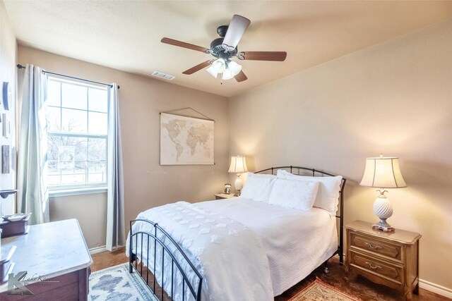 357 County Road 337, Tuscola, TX 79562 - bedroom featuring ceiling fan, baseboards, and visible vents