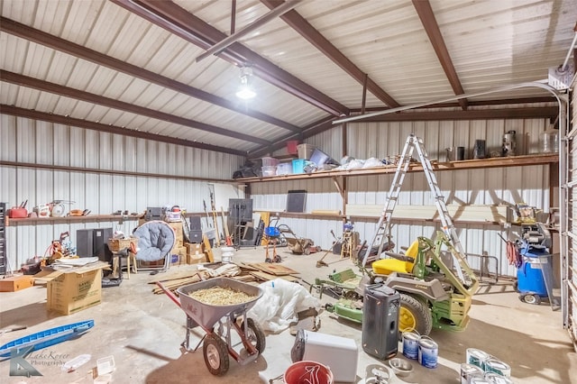 357 County Road 337, Tuscola, TX 79562 - garage with a workshop area and metal wall