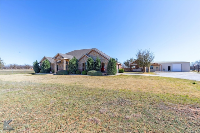357 County Road 337, Tuscola, TX 79562 - view of front facade with a front lawn and concrete driveway