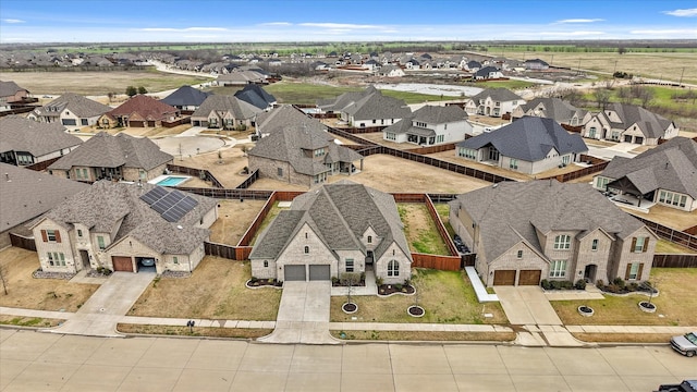 drone / aerial view with a residential view