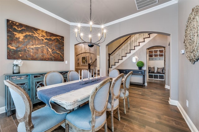 dining room with an inviting chandelier, stairway, visible vents, and arched walkways