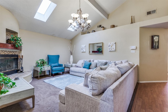 living area with baseboards, visible vents, a fireplace, high vaulted ceiling, and beam ceiling