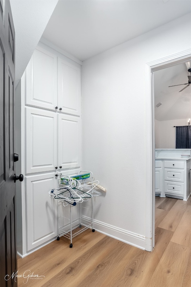 interior space with light wood-type flooring and baseboards