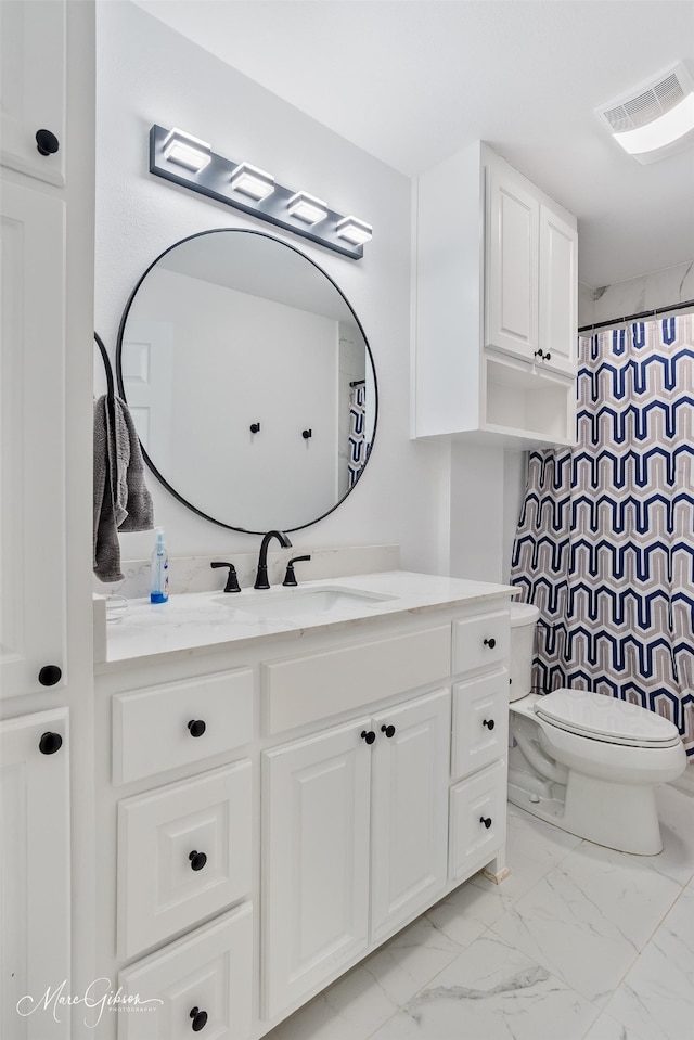 full bathroom with marble finish floor, curtained shower, visible vents, toilet, and vanity