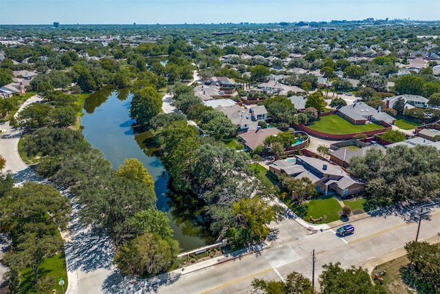 bird's eye view with a residential view and a water view