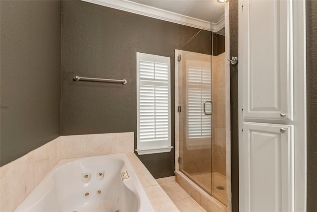 full bathroom featuring a textured wall, a tub with jets, a stall shower, and crown molding