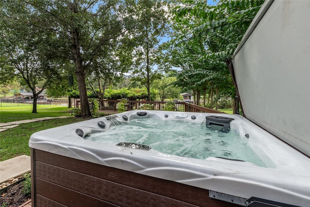 exterior space featuring a hot tub