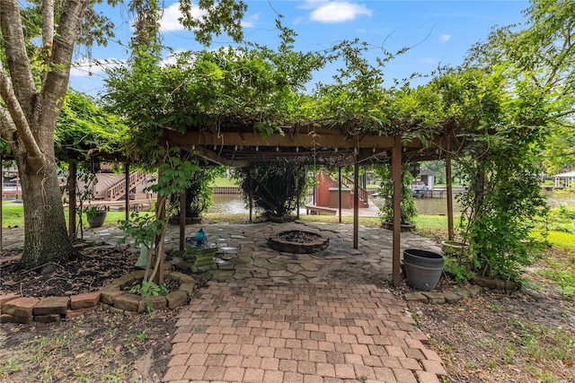 view of patio / terrace featuring a fire pit