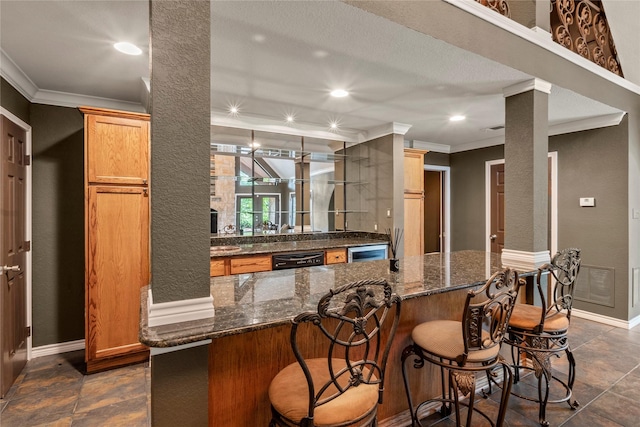 bar with recessed lighting, visible vents, a textured wall, ornamental molding, and dishwasher