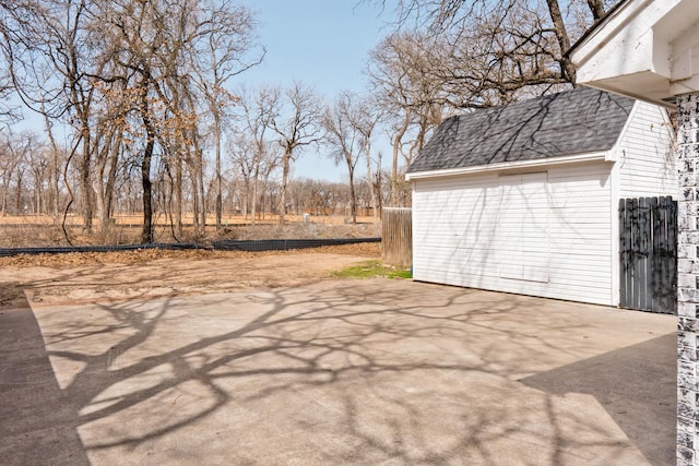 view of patio featuring fence