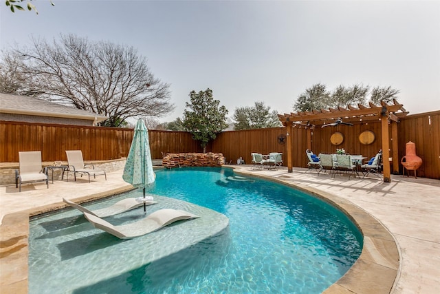 view of pool featuring a pergola, outdoor dining space, a fenced backyard, and a patio area