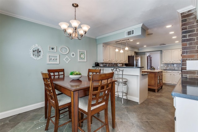 dining room featuring crown molding, a chandelier, baseboards, and recessed lighting