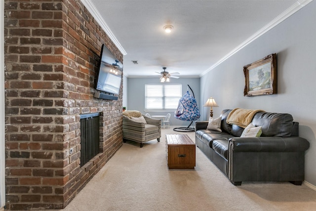living room with light carpet, crown molding, a fireplace, ceiling fan, and baseboards