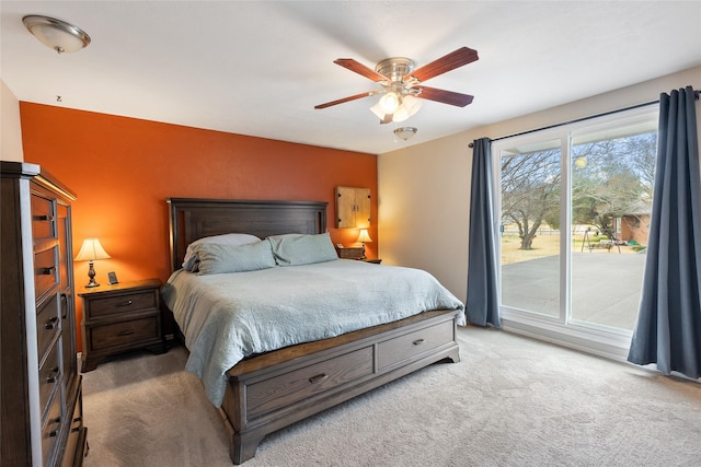 bedroom with carpet flooring and a ceiling fan