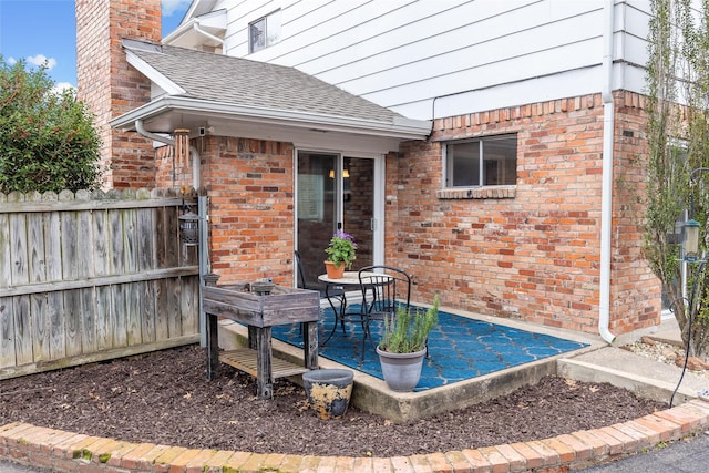 view of patio / terrace featuring outdoor dining space and fence