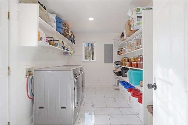 laundry room featuring marble finish floor, recessed lighting, washer and dryer, laundry area, and electric panel