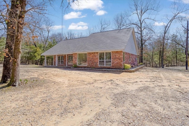 view of front of house with brick siding