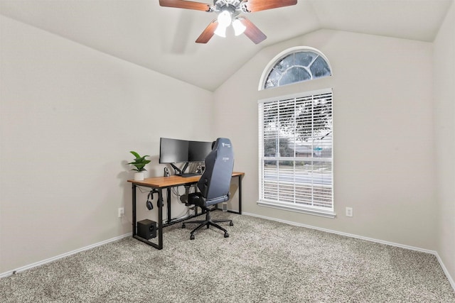 office area with vaulted ceiling, ceiling fan, carpet flooring, and baseboards