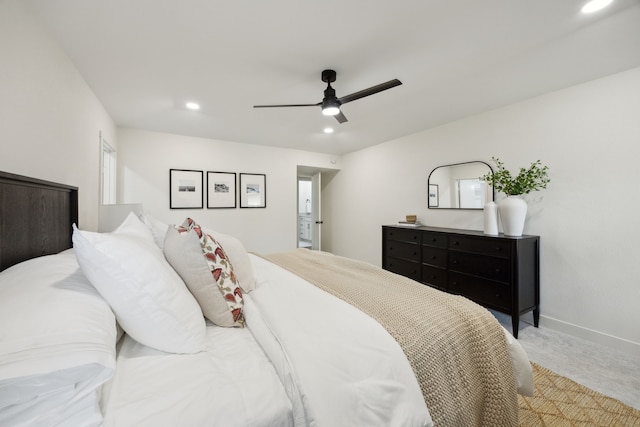 carpeted bedroom with baseboards, a ceiling fan, and recessed lighting