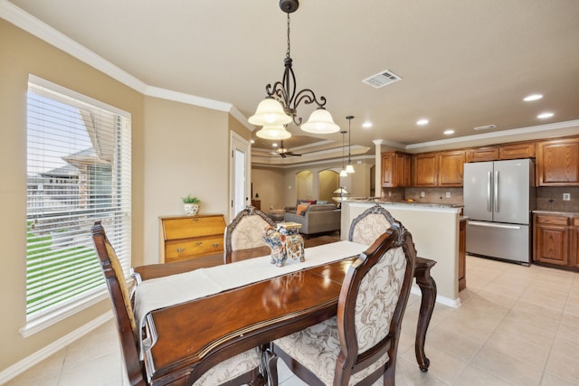 dining area featuring visible vents, recessed lighting, light tile patterned flooring, crown molding, and a chandelier