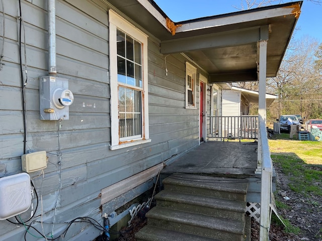 entrance to property with covered porch