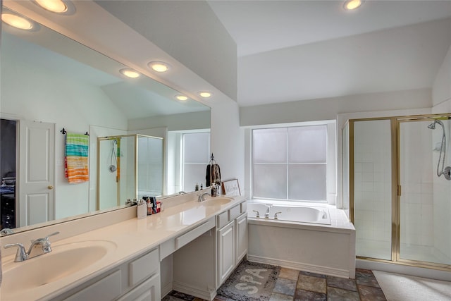 full bathroom featuring a sink, a stall shower, a bath, lofted ceiling, and recessed lighting