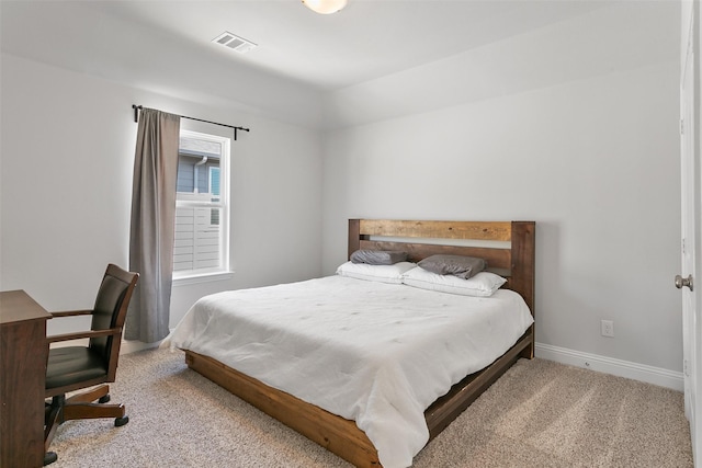 bedroom featuring carpet floors, baseboards, and visible vents