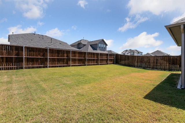 view of yard featuring a fenced backyard