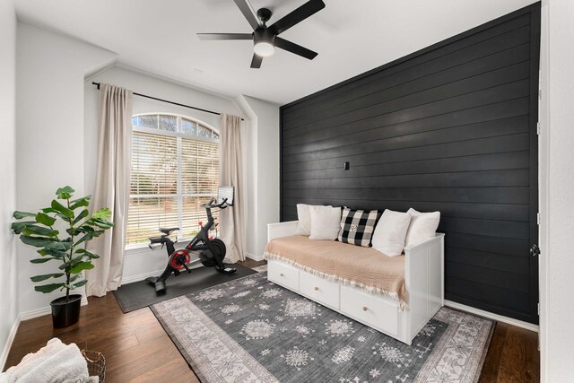 bedroom with lofted ceiling, dark wood-style flooring, visible vents, and crown molding