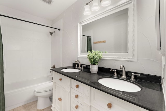 bathroom with visible vents, a sink, toilet, and shower / bath combo with shower curtain