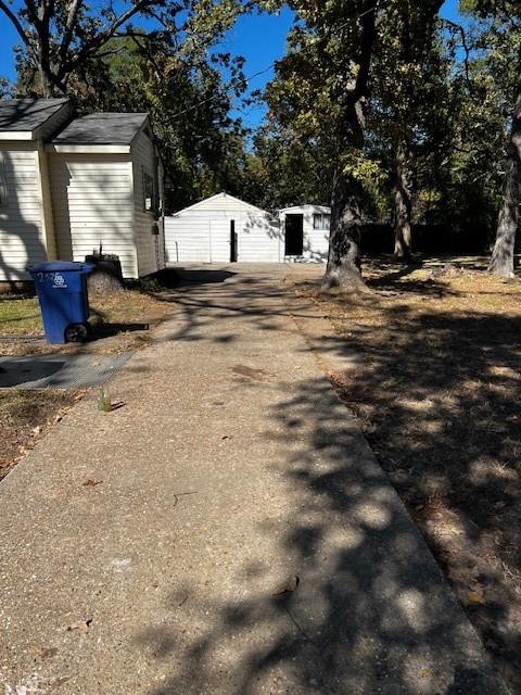 view of road featuring aphalt driveway