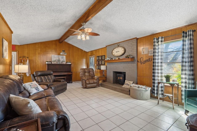 living room with a brick fireplace and wooden walls