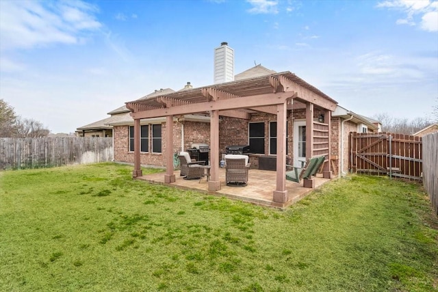 rear view of property featuring a fenced backyard, a pergola, a lawn, a patio area, and brick siding