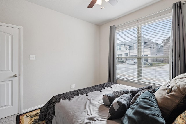 bedroom featuring ceiling fan