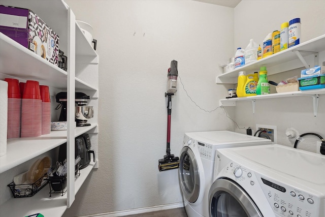 laundry room with laundry area and washer and dryer