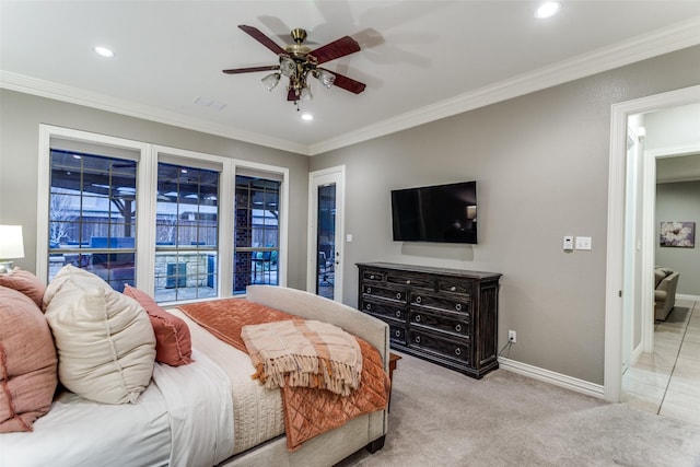 carpeted bedroom with baseboards, visible vents, and crown molding