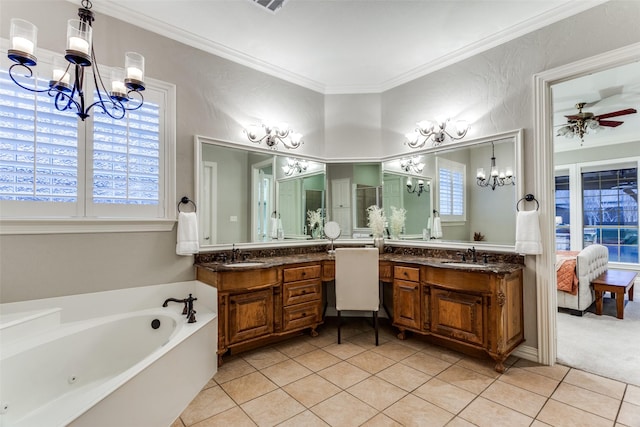 bathroom with a garden tub, ornamental molding, tile patterned flooring, and vanity