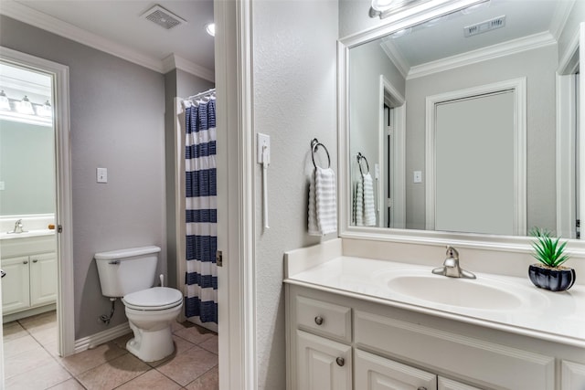 bathroom featuring ornamental molding, visible vents, vanity, and toilet