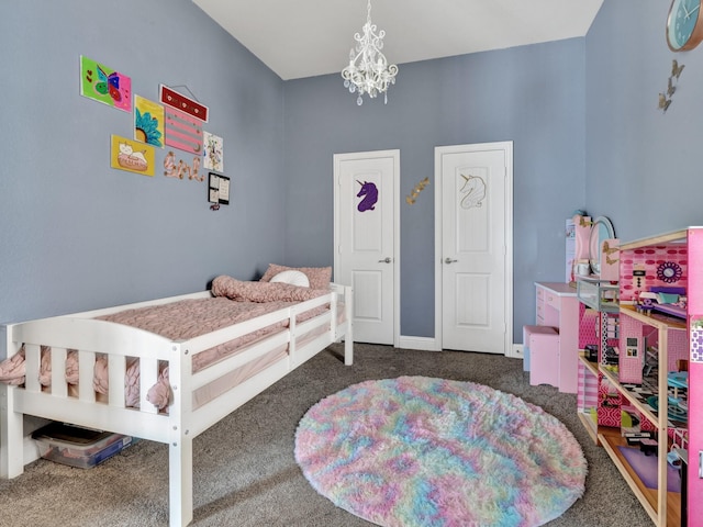 bedroom featuring baseboards, carpet floors, and a notable chandelier