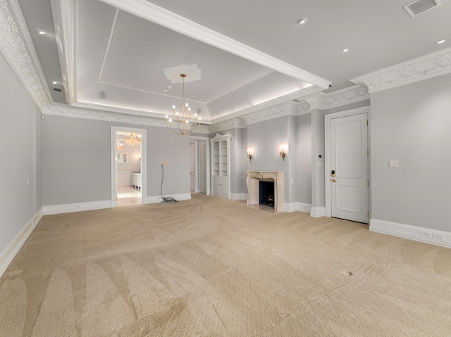 unfurnished living room with a raised ceiling, light colored carpet, visible vents, and a chandelier