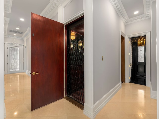 hallway featuring baseboards, visible vents, light tile patterned flooring, recessed lighting, and ornamental molding