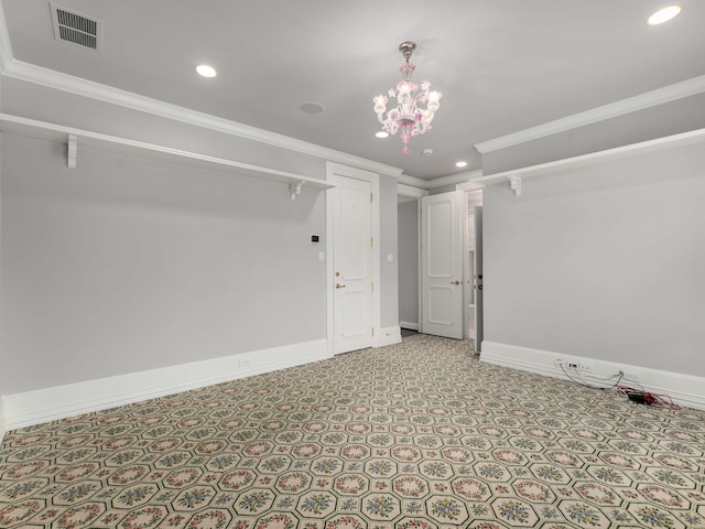 spare room with recessed lighting, visible vents, baseboards, and crown molding