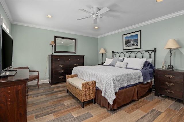 bedroom featuring baseboards, a ceiling fan, wood finished floors, crown molding, and recessed lighting