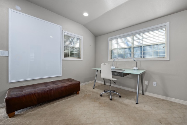 office space with lofted ceiling, carpet, and a wealth of natural light