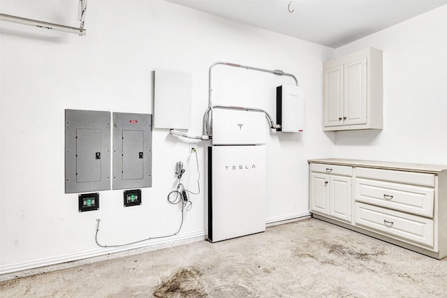 clothes washing area with electric panel