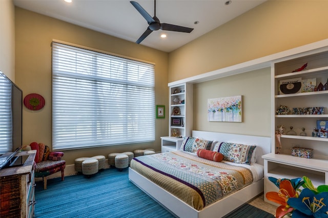 carpeted bedroom featuring a ceiling fan and recessed lighting