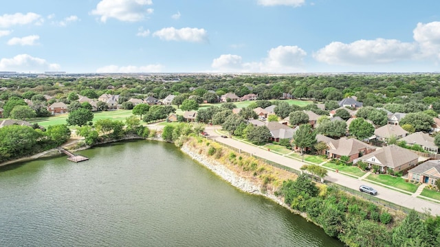 bird's eye view with a residential view and a water view